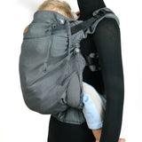 Double anthracite Didymos didyfix toddler carrier shown on mannequin showing neck rest adjusted to toddler's head