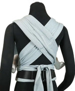 Back of Didymos didyflow baby carrier in ocean showing half buckle half tie waist belt and double layered tie on shoulder straps