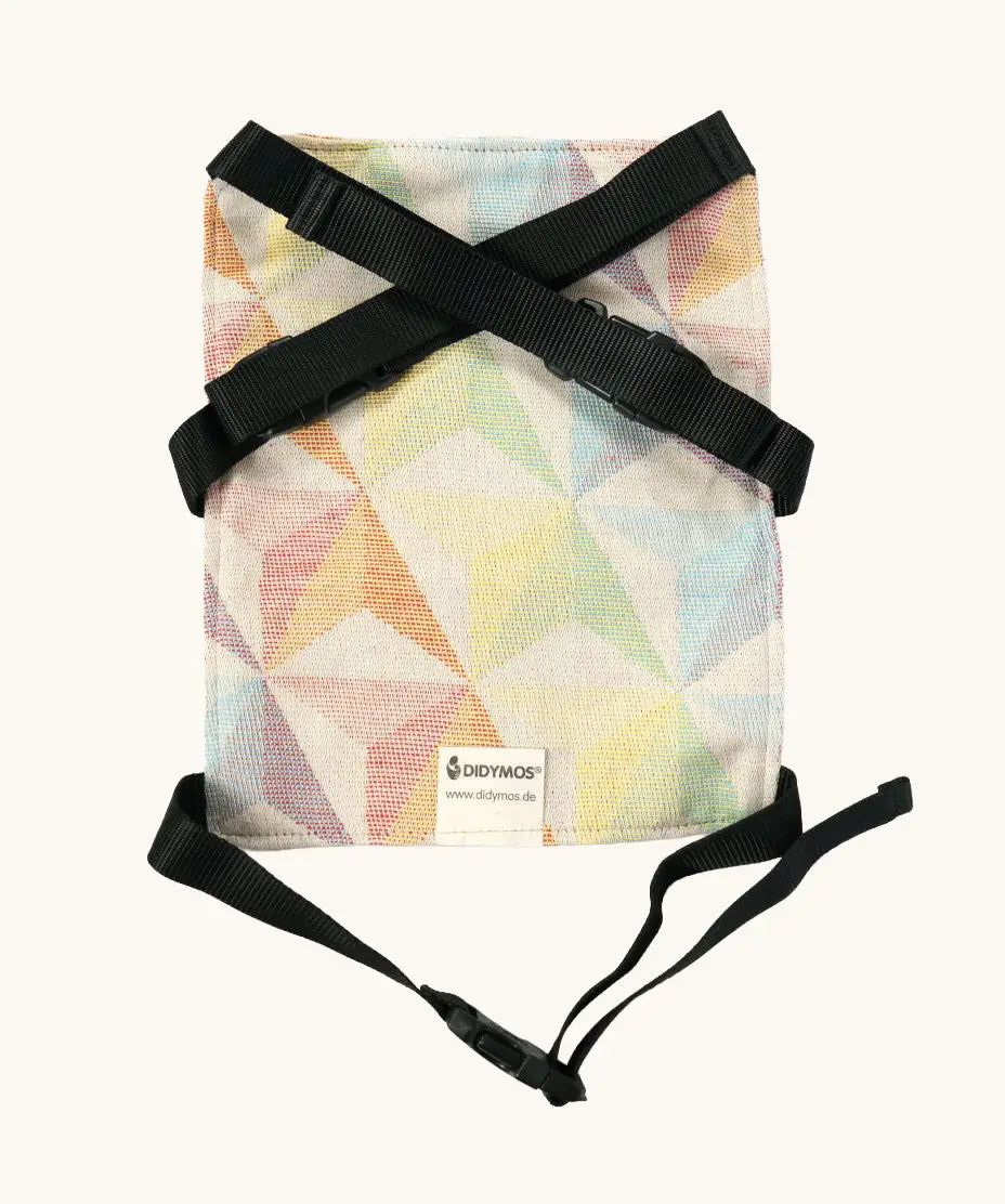 Didymos toy cotton carrier in the zephyr design laid flat showing buckles fastened 