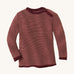 Disana organic merino wool melange jumper in a dark red colour on a cream background.