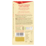 Back of Divine Fairtrade White Chocolate Bar with Strawberries 90g in packaging pictured on a plain white background
