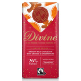 Divine Chocolate Fairtrade Milk Chocolate with Orange and Gingerbread Bar, in wrapper, on white background