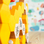 Close up of Bajo Hive pieces stacked in a tower