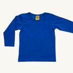 A blue Duns long sleeve top on a cream background.