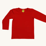 A red Duns long sleeve top on a cream background.