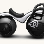 Side of the Early Rider supervelio baby balance bike on a beige background