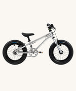 Side profile view of the The Early Rider Belter 14" Kids Pedal Bike for 3-5 Years in brushed aluminium. Babipur are official stockists of Early Rider. 