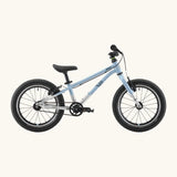 Side of a Early Rider belter 16 inch kids bicycle showing a arctic blue top half and brushed aluminium bottom half frame