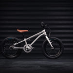 Early rider kids 14 inch belter bicycle in a dark workshop