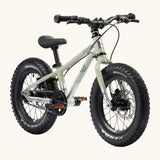 Early Rider kids Seeker 14 inch mountain bike in sage green with a brushed aluminium bottom half. Features disk brakes and chunky wheels