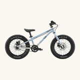 Side of Early Rider kids Seeker 16 inch mountain bike in arctic blue with a brushed aluminium bottom half frame. Features disk brakes and chunky wheels
