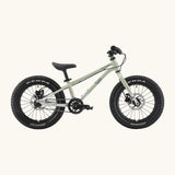 Side of Early Rider kids Seeker 16 inch mountain bike in sage green with a brushed aluminium bottom half frame. Features disk brakes and chunky wheels