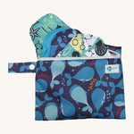 Earthwise starter kit includes 4 reusable period pads and a coordinating mini wet bag purse in Under the sea print.