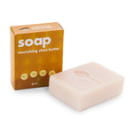 Ecoliving handmade nourishing shea butter soap bar on a white background next to its cardboard box