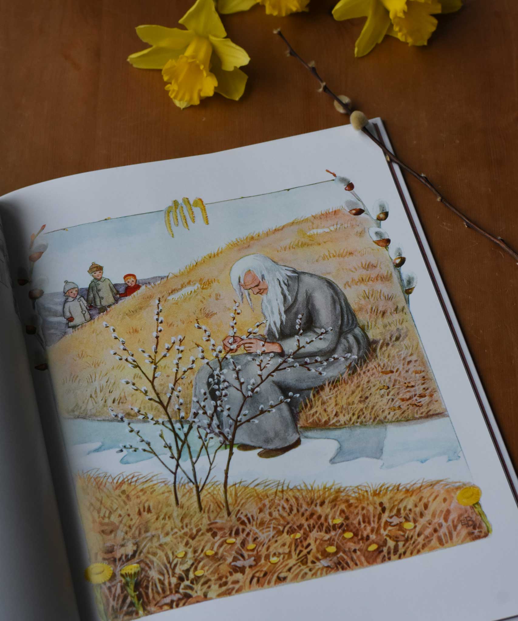 The March illustration featured in the Around The Year children's hardback book by Elsa Beskow. The illustration is of March depicted as an old man. 