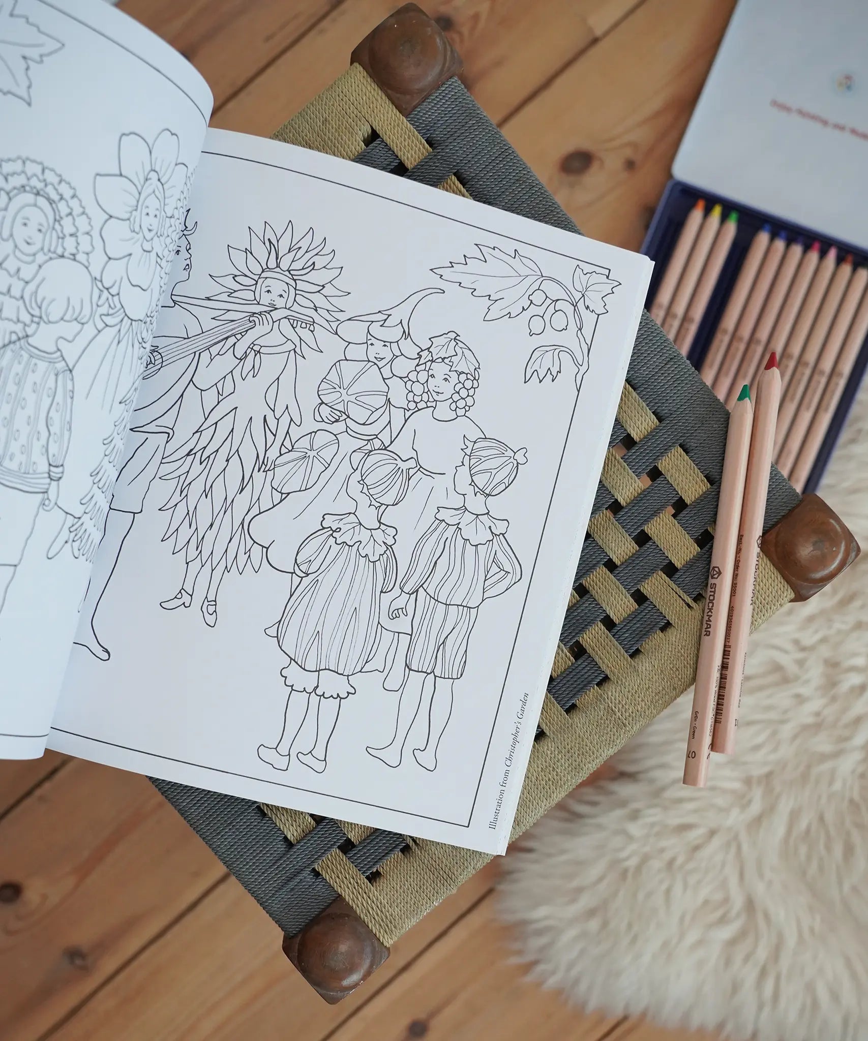 Inside page from the The World of Elsa Beskow: A Vintage Colouring Book. Black and white line art coloring page illustration depicting Christopher's Garden. 