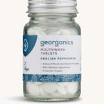 Georganics Mouthwash Peppermint tablets pictured on a cream backgorund