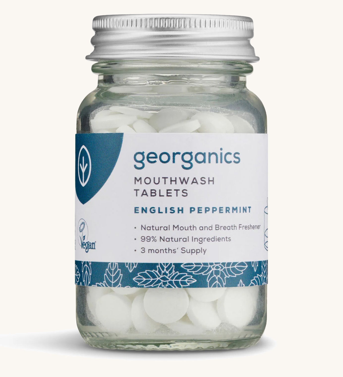 Georganics Mouthwash Peppermint tablets pictured on a cream backgorund