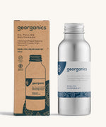 A bottle of the Georganics english peppermint oil pulling mouthwash with the box