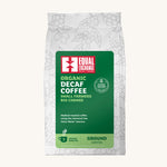 The Equal Exchange organic and fairtrade decaf ground coffee, medium roasted, in a white 200g bag.