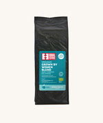 The Equal Exchange organic Grown by Women blend coffee beans, in a 1kg black recyclable packaging bag. 
