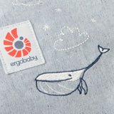 Cute whale and cloud embroidery on the Ergobaby denim dream toy carrier