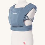 Ergobaby Embrace Soft Knit Newborn Baby Carrier in Oxford Blue. Side view on a mannequin.