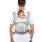 Man with short brown hair and a white t-shirt wearing a baby on his back in the Ergobaby Adapt  SoftFlex™ Mesh Baby Carrier in Pearl Grey. Back view, white background. 