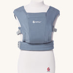 Ergobaby Embrace Soft Knit Newborn Baby Carrier in Oxford Blue. Front view on a mannequin.