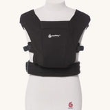 Ergobaby Embrace Soft Knit Newborn Baby Carrier in Pure Black. Front view on a mannequin.