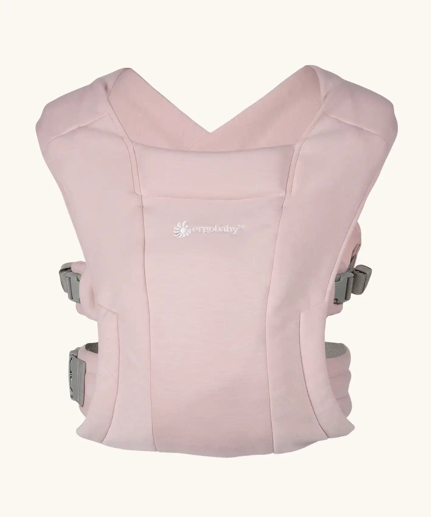Ergobaby Embrace soft knit newborn baby carrier in blush pink. Front on view.