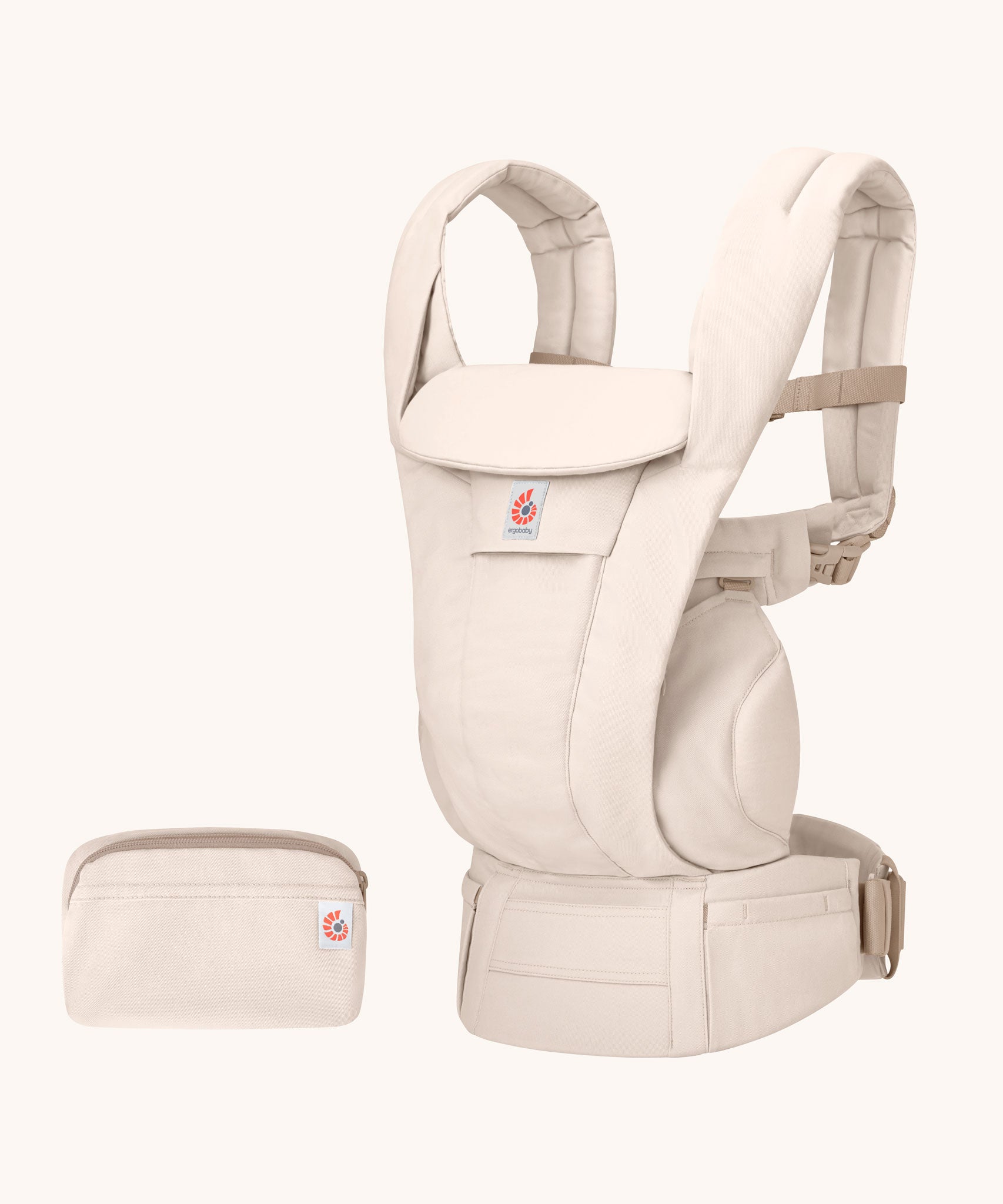 The Ergobaby Omni Deluxe Cotton baby carrier in Natural Beige, with a handy storage purse that can attach to the carrier.
