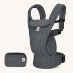The Ergobaby Omni Deluxe Mesh baby carrier in Graphite Grey, with a handy detachable storage bag.