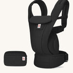 The Ergobaby Omni Deluxe Mesh baby carrier in Onyx Black, with a handy detachable storage bag.