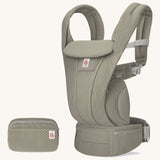 The Ergobaby Omni Deluxe Mesh baby carrier in Soft Olive, with a handy detachable storage bag.