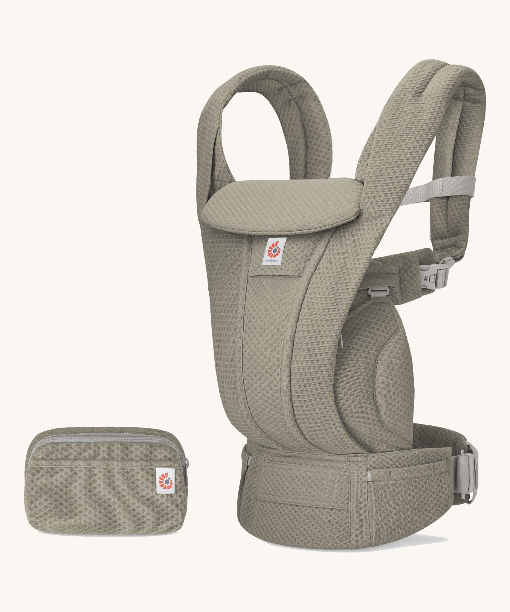 The Ergobaby Omni Deluxe Mesh baby carrier in Soft Olive, with a handy detachable storage bag.