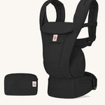 The Ergobaby Omni Deluxe Cotton baby carrier in Onyx Black, with a handy storage purse that can attach to the carrier.