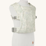 The Ergobaby Soft & Snug knit baby carrier in a sage meadows pattern.