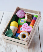 Erzi assorted candies wooden play food set. Wooden toy play food in a small wooden crate.