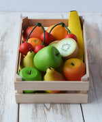 Erzi big wooden toy crate for fruit filled with wooden fruit play food including cherries, kiwis, bananas, apples, lemons and oranges.