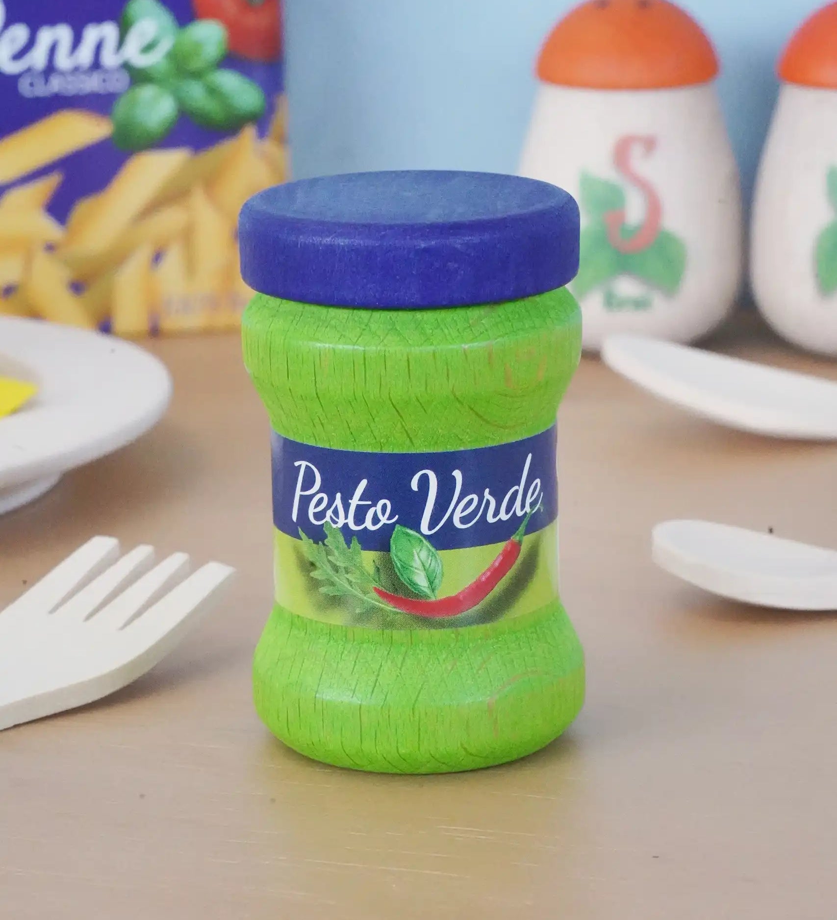Erzi Wooden Pesto Verde Play Food Jar in the Babipur playroom with other playfood in the background.