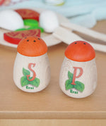 Erzi wooden play food salt and pepper shakers in the Babipur playroom.
