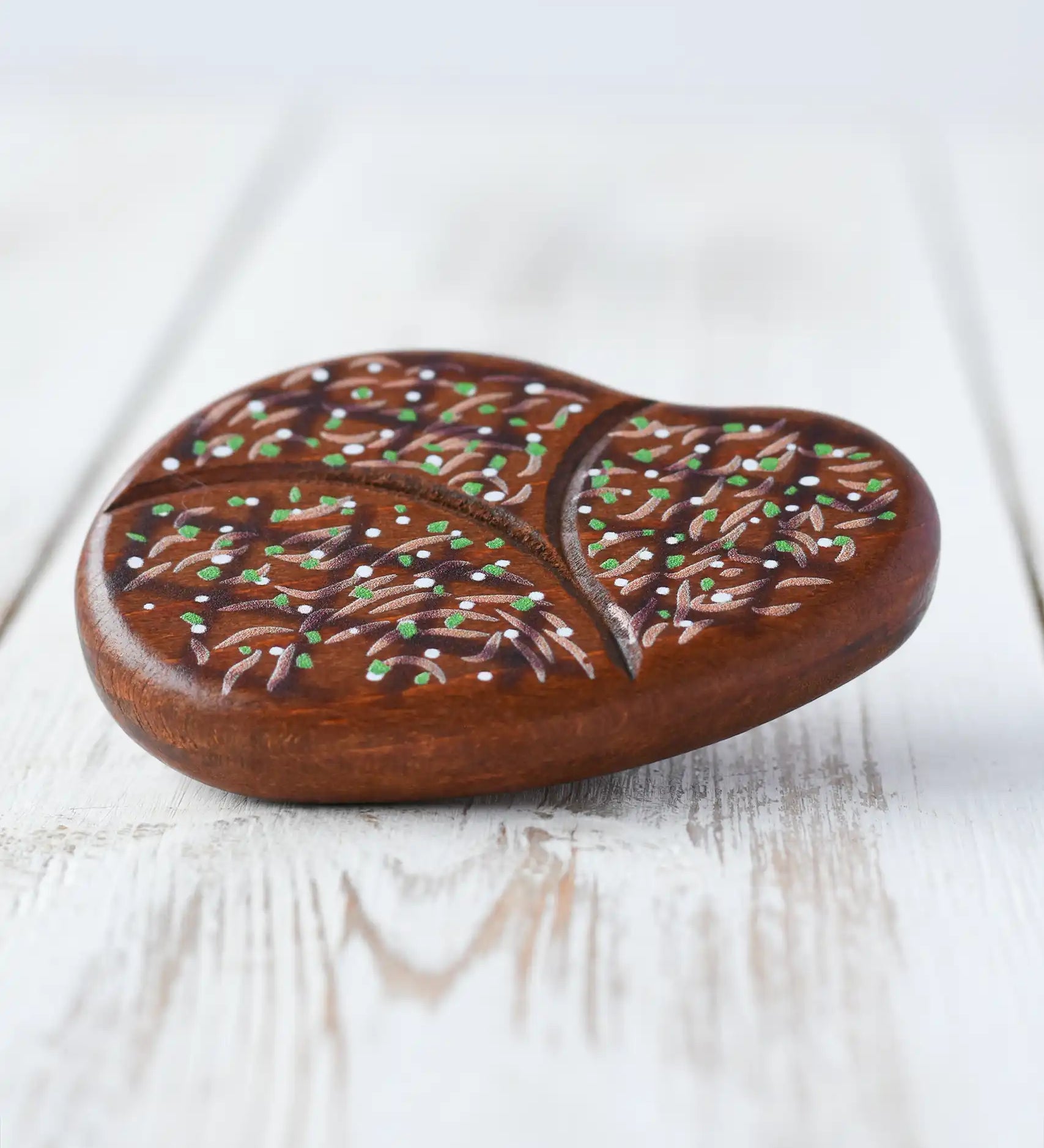 Erzi steak wooden play food toy placed on a wooden surface. 