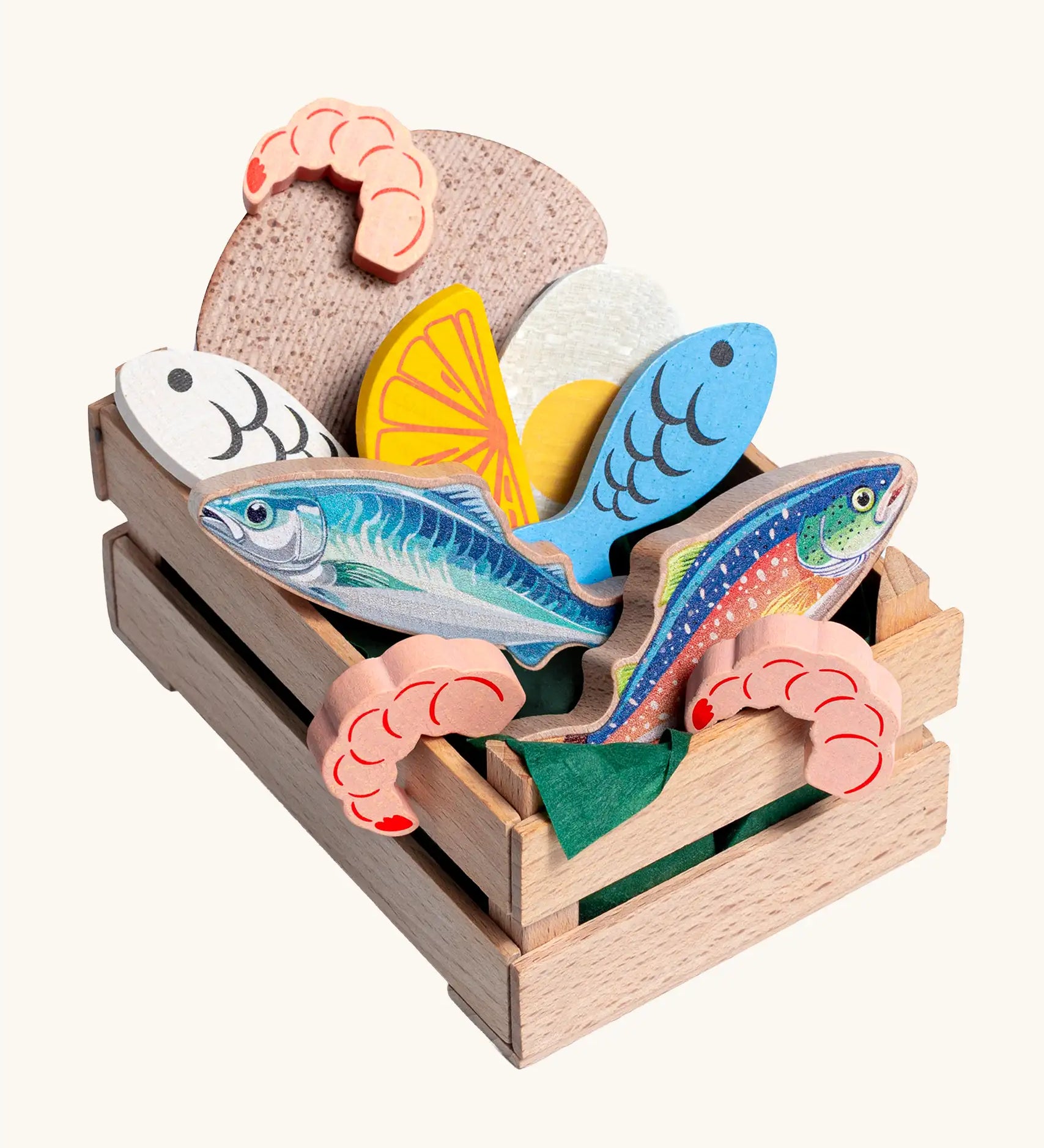 Erzi fish assortment wooden food play set in a wooden crate. Set contains 5 types of fish, 3 shrimps, bread, half and egg and lemon slice.
