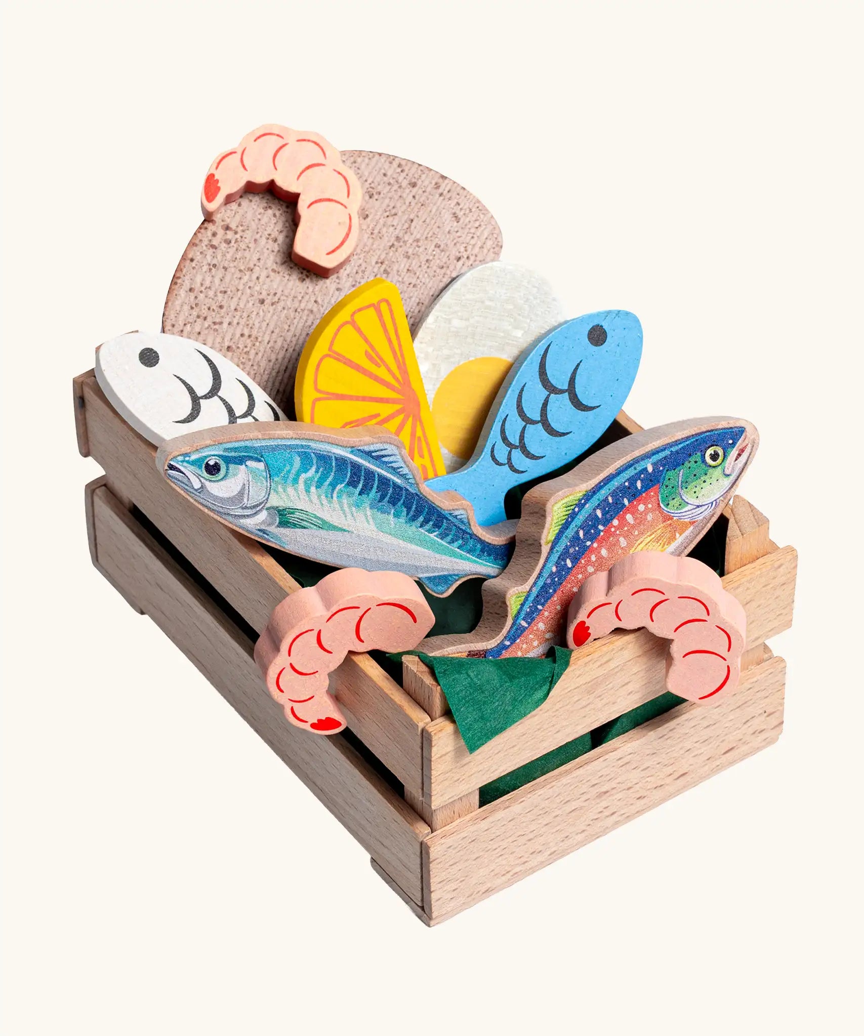 Erzi fish assortment wooden food play set in a wooden crate. Set contains 5 types of fish, 3 shrimps, bread, half and egg and lemon slice.
