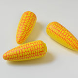 Three Erzi Sweetcorn Corn Cob Wooden Play Food on a white background