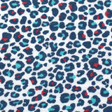 A closer look at the colourful red and light blue spotted print on the Etta Loves Extra Large Organic Cotton Baby Muslin Square - Blue Leopard