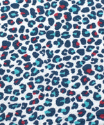 A closer look at the colourful red and light blue spotted print on the Etta Loves Extra Large Organic Cotton Baby Muslin Square - Blue Leopard
