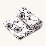 Etta Loves Extra Large Organic Cotton Baby Muslin Square - Dandelion, on a cream background