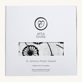 Etta loves dandelion XL muslin square showing in its white box with brand logo on the front